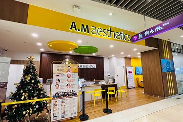 Aesthetic clinic reception area with a festive decoration and modern design.